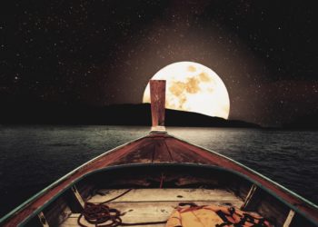 Wooden boat in the moon light poster