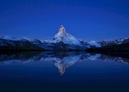 Matterhorn mirroring in lake Stellisee poster