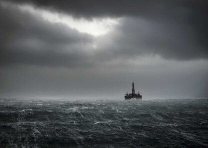 Oil platform on the ocean during a storm poster