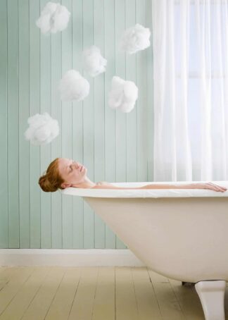 A girl relaxing in the bath poster