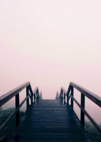 Wooden staircase in pink mist poster