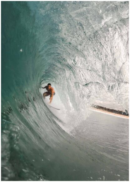 Surfer in a big wave poster