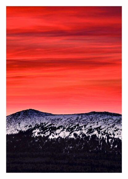 Snowy mountain in the red sunset poster